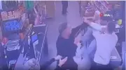 Başakşehir'de market çalışanı bıçak, müşterinin eşi silah çekti