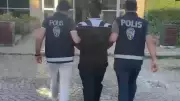 İzmir Buca'da Cinayet Hükümlüsü Yakalandı, Silah ve Uyuşturucu Ele Geçirildi