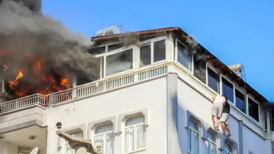 Antalya'da Yangın: Teras Katında Mahsur Kalan 2 Kişi Korkuluk Demirine Tutundu