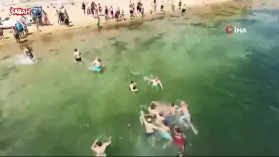 Erdek'te boğulma tehlikesi: Vatandaşlar seferber oldu, kurtarma anları kamerada