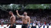 Gençlik ve Spor Bakanı Osman Aşkın Bak, Erkan Taş'ı Tebrik Etti