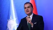 Ömer Çelik'ten ayet yazılı pankartı indirmeye çalışanlara sert tepki