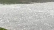 Ardahan'da yaz ortasında dolu yağışı dağları beyaza bürüdü